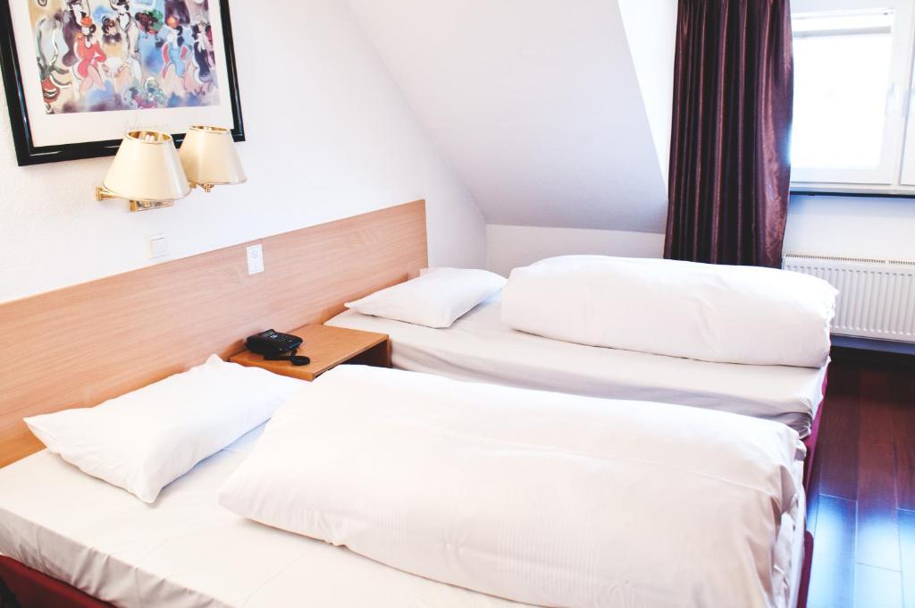 Rugs Hotel Duesseldorf Pokoj fotografie